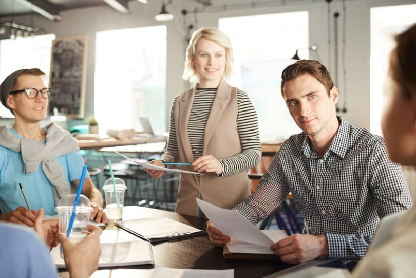 Three team members communicating on collaboration